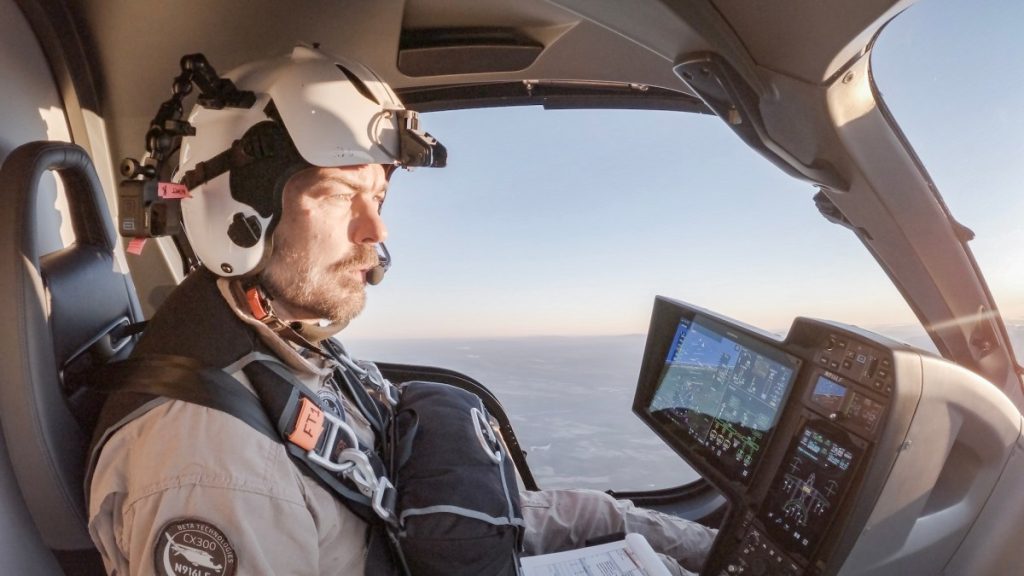 man in cockpit of small plane